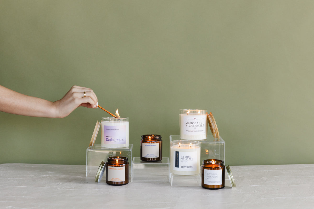 Custom-labeled Calyan candles styled for a corporate gift