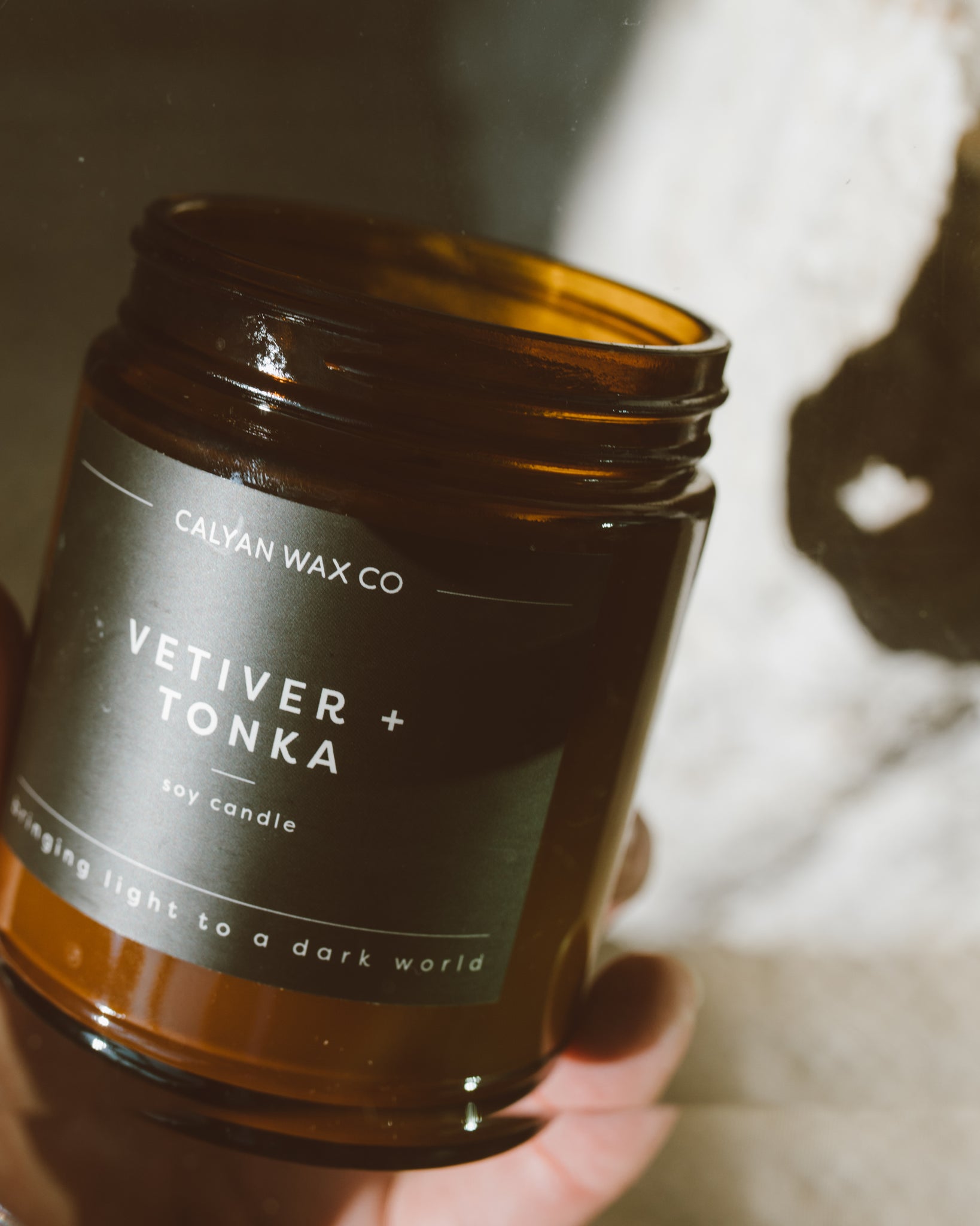 Vetiver + Tonka Soy Candle in a Mini Amber Jar - Calyan Wax Co.